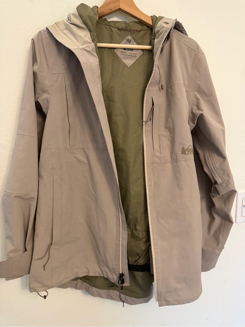 REI Co-op Men’s Hooded Raincoat in Stone with Olive Lining Gortex